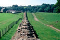 Hadrian's Wall, built by Romans to secure northern boundary of Britannia, runs with a walking path from Irish to North Sea entirely within England. Scotland