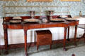 Dining room sideboard with silver serving dishes plus cellaret below at Haddo House. Methlick, Scotland.