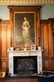 Portrait of Countess of Aberdeen, wife of governor general of Canada over Adamesque fireplace in library at Haddo House. Methlick, Scotland.