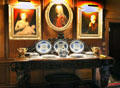 Dining room sideboard with china under family portraits at Brodie Castle. Brodie, Scotland.