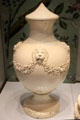 Creamware vase with conical lid decorated with lions holding garlands with traces of original gilding by Josiah Wedgwood at World of Wedgwood. Barlaston, Stoke, England.