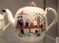 Queen's Ware teapot with painted Chinese figures by Wedgwood at World of Wedgwood. Barlaston, Stoke, England.