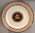 Queen's Ware Etruscan pattern red & black transfer-printed plate by Wedgwood at World of Wedgwood. Barlaston, Stoke, England.
