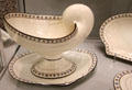 Queen's Ware dessert service dishes in shape of nautilus & scallop sea shells with pattern 384 enameled trim by Wedgwood at World of Wedgwood. Barlaston, Stoke, England.