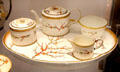 Wedgwood Queen's Ware tea set on tray in Brewster shape printed with Japonica pattern at World of Wedgwood. Barlaston, Stoke, England.