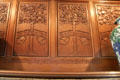 Arts & Crafts carved panels over drawing room fireplace at Wightwick Manor. Wolverhampton, England.