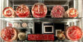 Collection of red ceramic plates tiles by William De Morgan. England.