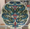 Snake & Shield tin-glazed earthenware dish by William De Morgan in private collection. England.