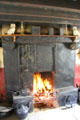 Kitchen fireplace in Coshkib Hill Farm at Ulster Folk Park. Belfast, Northern Ireland.