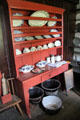 China shelf in Campbell House at Ulster American Folk Park. Omagh, Northern Ireland.