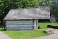Springhouse on Pennsylvania log farm at Ulster American Folk Park. Omagh, Northern Ireland.