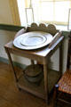 Washstand in brick house at Ulster American Folk Park. Omagh, Northern Ireland.