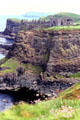Dunluce Castle perched on cliffs. Northern Ireland