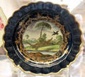 Porcelain dessert plate painted with crocodile & serpent perhaps by Jeffreyes Hamett O'Neale for Worcester factory at British Museum. London, United Kingdom.