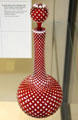 Red glass decanter with outer white layer cut away as spiral prob. shown at Great Exhibition of 1851 by George Bacchus & Sons of Birmingham, England at British Museum. London, United Kingdom.
