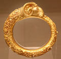 Gold ram's head bangle from Rome at British Museum. London, United Kingdom.