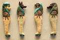Faience amulets of sons of Horus at British Museum. London, United Kingdom.