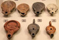 Collection of Roman oil lamps mostly made in England at British Museum. London, United Kingdom.