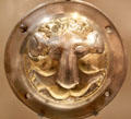 Sasanian Empire silver plate shield boss in shape of lion face from Iran at British Museum. London, United Kingdom.