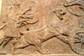 Detail of Assyrian lion hunt carved panel from North-West Palace of Nimrud at British Museum. London, United Kingdom.