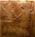 Assyrian carved panel of protective spirits from North Palace of Nineveh at British Museum. London, United Kingdom.