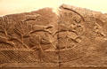 Assyrian carved panel shows netting of deer from North Palace of Nineveh at British Museum. London, United Kingdom.