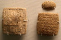 Cuneiform letter plus a small addendum & their clay envelope at British Museum. London, United Kingdom.