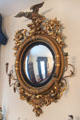 Mirror with American eagle in dining room at Conde-Charlotte Museum. Mobile, AL.