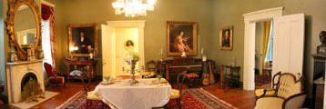 Back parlor with piano at Historic Oakleigh Museum House. Mobile, AL.