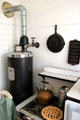 Water heater beside kitchen stove at Clinton Birthplace Home. Hope, AR.