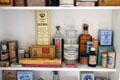 Bathroom cabinet with antique first aid boxes in Corbett House at Tucson Museum of Art. Tucson, AZ.