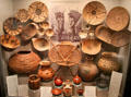 Collection of Akimel O'odham native baskets, wooden bowls & ceramic jars at Arizona State Museum. Tucson, AZ.