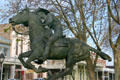 Pony Express monument against the Victorian buildings of Old Sacramento. Sacramento, CA.