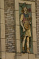 Terra-cotta panel of medieval string player on Palace Theater. Los Angeles, CA.