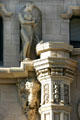 Sculpted figure carrying thunderbolt & electric motors on Million Dollar Theater. Los Angeles, CA.