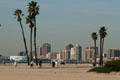 Downtown skyline of Long Beach from east over beach. Long Beach, CA.