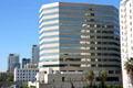 Crocker Plaza reflecting Breakers Retirement Apartments. Long Beach, CA.