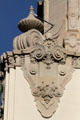 Scrolls & faces atop Beverly Hills City Hall. Beverly Hills, CA.