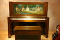 Steinway upright piano with painted western scene once owned by Doheny family at Autry National Center. Los Angeles, CA