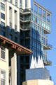 101 Market Street with outward sloping glass walls enclosing balconies. San Diego, CA.