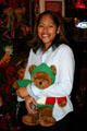 Young woman with stuffed bear in Old Town. San Diego, CA.