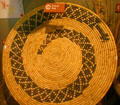 Kumeyaay coiled basket tray with spiral snake design at San Diego Museum of Man. San Diego, CA.