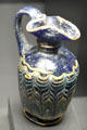 Greek or Etruscan blue glass pitcher with white, yellow & turquoise feathered decoration at Getty Museum Villa. Malibu, CA.