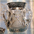 Cut glass base with silver rim & three handles at Historical Glass Museum. Redlands, CA.