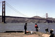 Golden Gate Bridge over fishermen at Marina District. San Francisco, CA.