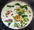 Porcelain plate with insects & plants from Chelsea, England at Legion of Honor Museum. San Francisco, CA.