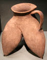 Neolithic earthenware tripod vessel with single handle from Shaanxi, China at Asian Art Museum. San Francisco, CA.