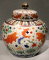 Porcelain covered jar painted with carp & lotus pond from China at Asian Art Museum. San Francisco, CA.