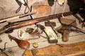Display of typical miners' tools including firearms & powder horns in Columbia Museum at Columbia State Historic Park. Columbia, CA.