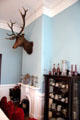 Formal dining room with deer's head at Pardee Home Museum. Oakland, CA.
